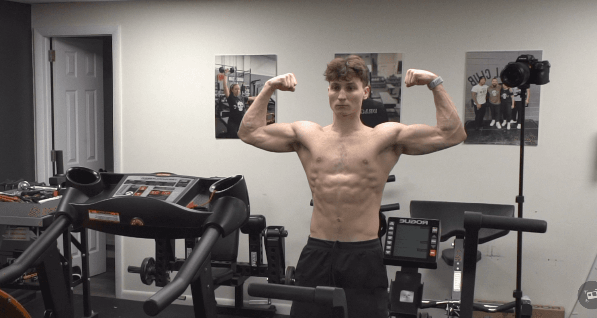 Jake Peterson front bicep pose